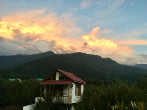Litte red cottage with a view to behold